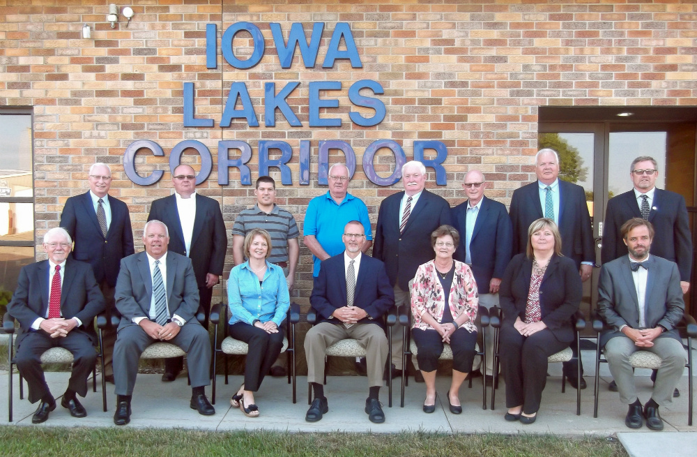 Iowa Lakes Corridor Development Corporation Board of Directors group photo outside Corridor office building